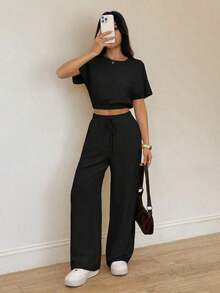Conjunto de dos piezas con top corto de manga murciélago y pantalones con cordón en la cintura, de tela texturizada.Conjunto de dos piezas casual, cómodo y para tallas altas para mujeres. - Negro - Ver 6
