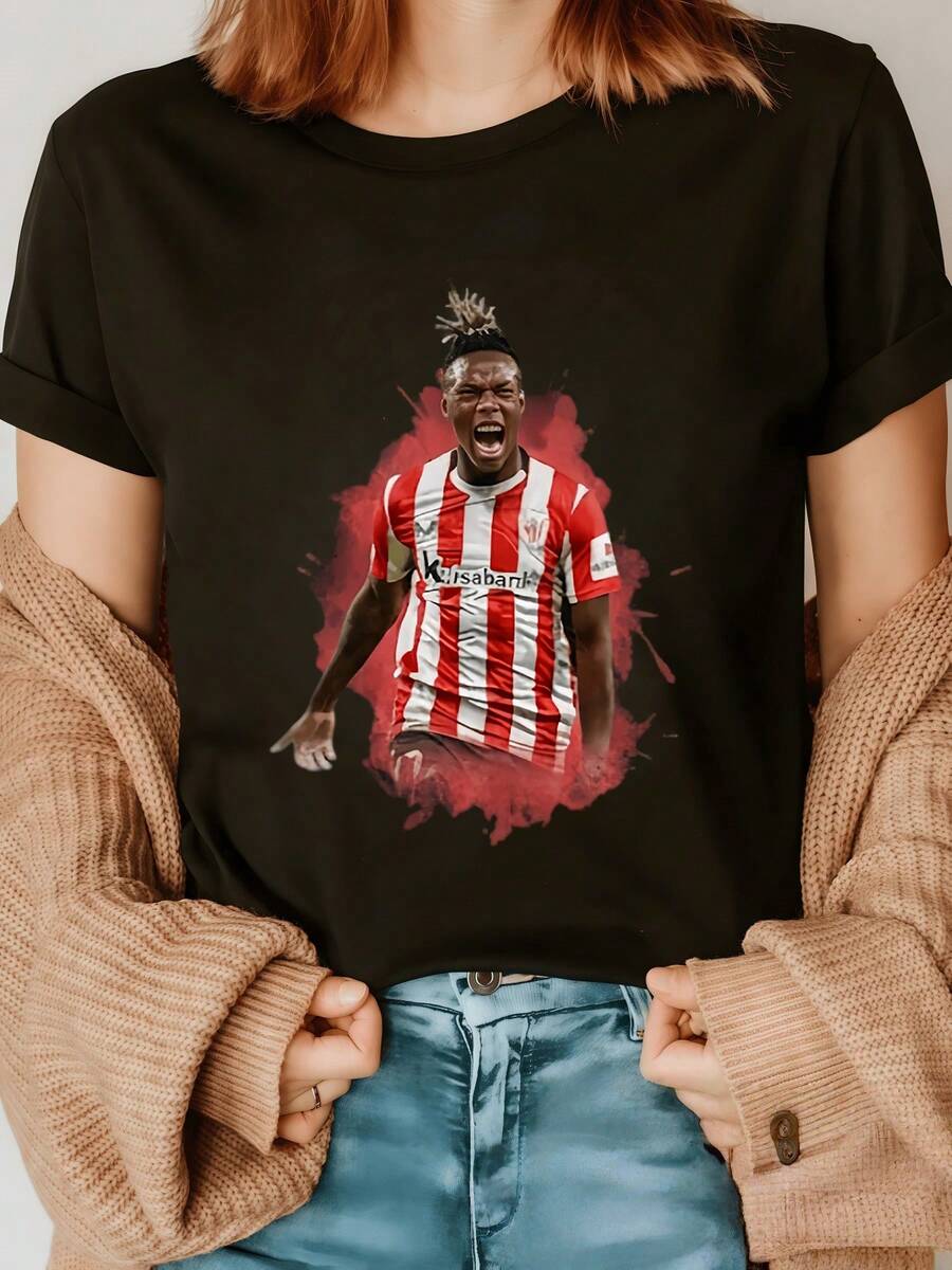 Player In Action Wearing A Red And White Striped Uniform Symbolizing Passion For Football, Dynamic Energy, And Modern Sportsmanship. Comfortable And Attractive Casual Women's T-Shirt. - 黑色 - 查看 1