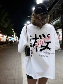 Camiseta de manga corta con cuello redondo y estampado de flores de cerezo japonés para mujer, top moderno y versátil de color blanco para verano. - Blanco - Ver 9