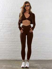 Sport Leggings ajustados de cintura contorneada y cruzada para actividades, pádel, tenis, pickleball, gimnasio, fitness, pilates y uso casual diario - Marrón Chocolate - Ver 1