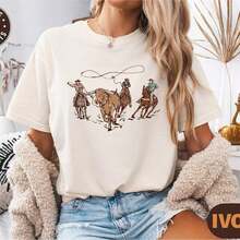 Camisa vaquera del oeste, camiseta vintage del oeste de los 90, estética campestre, atuendo de rodeo R, extraterrestre vaquero, suéter vaquero del oeste salvaje. Camiseta 100% algodón de 220g - Talla M - Estilo y comodidad duraderos. Adecuada para todas las personas, ya sean mujeres o hombres. Tela duradera de alta calidad, adecuada para todas las estaciones, suave al tacto pero construida para durar. Camisetas transpirables para mujeres, ropa de otoño para mujeres, ropa de vacaciones para mujeres, disfraz de Halloween para mujeres, blusas bonitas 100% algodón. - Blanco - Ver 1