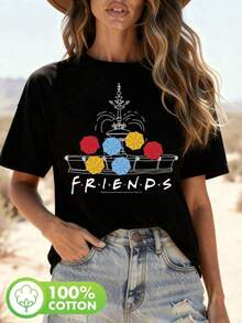 Camiseta Casual de Manga Corta para Mujer WB con Estampado de Paraguas y Logo de la Serie 'Friends' - Blusa Semi-Transparente Blanca para Looks de Primavera y Verano (Lavable a Máquina) 100% algodón - Negro - Ver 2