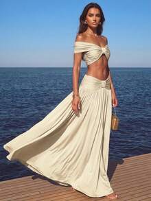 Perirose Conjunto feminino elegante bege de duas peças com top cropped torcido ombro a ombro e calça pantalona, modelo sem mangas, perfeito para resorts e para um look sexy de praia. - Luz amarela - Ver 3