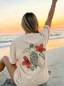 Conjuntos de mujer: Camiseta de verano para mujer con estampado de tortuga tropical y plumeria en la espalda, de corte holgado, cuello redondo, manga corta, estilo casual para vacaciones. - Albaricoque - Ver 7