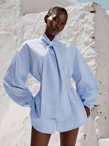 Camisa azul cielo de estilo francés elegante, holgada, con mangas cortas acampanadas, lazo delantero y pliegues, adecuada para el trayecto al trabajo y citas en primavera/verano - Celeste - Ver 2