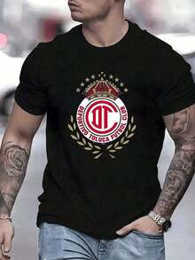 Symbol Of The Deportivo Toluca Club With A Golden Crown And Stars Representing The Sporting Glory And Fighting Spirit Of The City. Men's Plus Size T-Shirts, 100% Cotton, Comfortable And Durable For Everyday Wear And Football Fans. - 黑色 - 查看 1