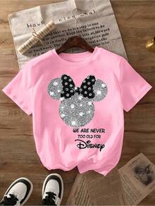 Disney Authorized Women's Fashion Project, Featuring Minnie Mouse Prints And Shiny Diamond Bows. This Stylish And Lovely T-Shirt With Short Sleeves And Round Neck Is Comfortable And Versatile, Which Is Very Suitable For Casual Wear In Spring, Summer And Autumn. Couples Shirts Are Unisex And Holiday Gifts. - Hồng - Xem 1