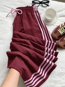 Pantalones de chándal casuales y holgados con cintura elástica y rayas laterales marrones para mujer - Burdeos - Ver 12