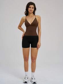 TimeOff 1 pieza Pantalones cortos deportivos de mujer con ajuste ceñido y diseño en V cruzado en la cintura - Negro - Ver 9