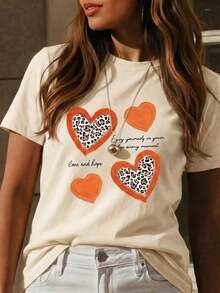 Nueva camiseta de manga corta con cuello redondo para mujeres, diseño primavera-verano, combina perfectamente letras modernas y estampado en forma de corazón, transpirable y absorbe la sudoración. Envío directo desde nuestro almacén local, modelo para parejas, ideal para llevar en pareja. UEIS - Naranja - Ver 2