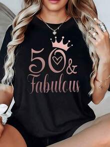 Frase inspiradora 50 & Fabulous con corona rosada que simboliza la elegancia y celebración de la vida en camiseta de mujer 100% algodón 220g - Negro - Ver 2