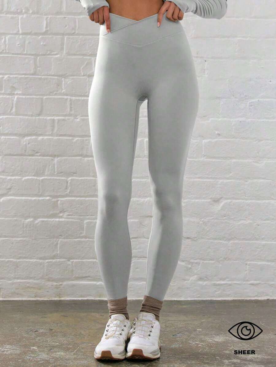 Sport Leggings ajustados de cintura contorneada y cruzada para actividades, pádel, tenis, pickleball, gimnasio, fitness, pilates y uso casual diario - Gris Claro - Ver 1