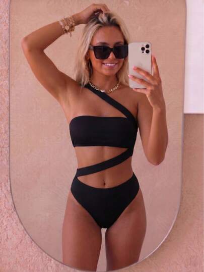 Traje de baño monokini de mujer con un hombro y diseño calado, elegante para vacaciones en la playa, color negro