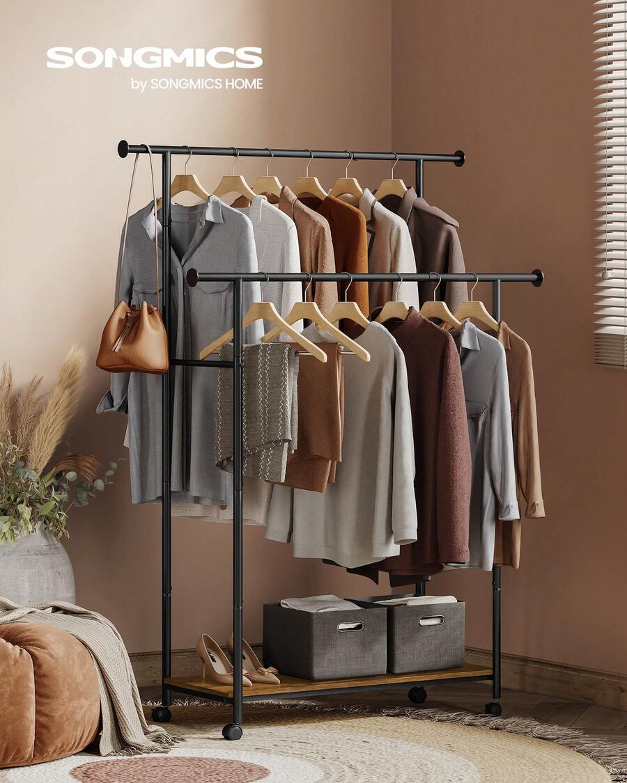 SONGMICS Perchero de ropa con 2 barras y ruedas, de 38.8 pulgadas, con estante para colgar ropa, capacidad de carga de hasta 220 lb, para dormitorio y armario - Marrón rústico y negro tinta - Ver 1