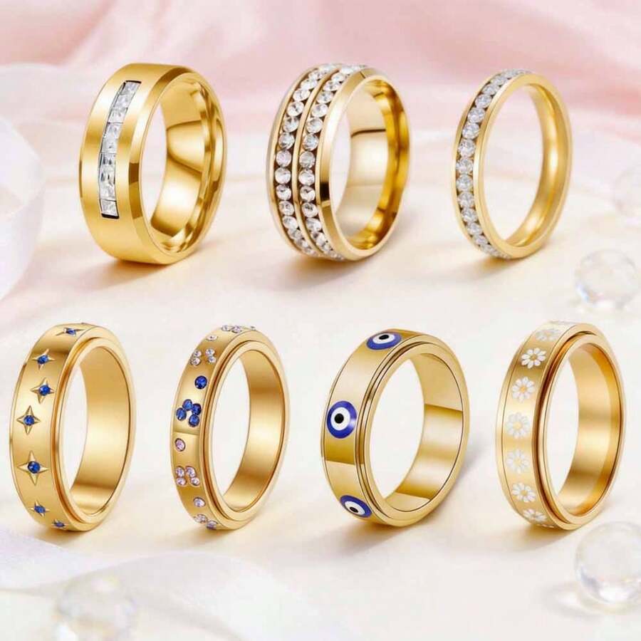 Bộ 7 chiếc nhẫn xoay được bằng thép không gỉ mạ vàng, đính đá Zirconia, chống trầy xước, không phai màu, phong cách sang trọng, phù hợp để đeo hàng ngày, dự tiệc, hẹn hò, cưới hỏi, làm quà tặng. - Bộ bảy món - Xem 1