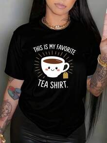La camiseta 100% de algodón es mi favorita para tomar té. Tiene un estampado de una taza de té con una cara sonriente de dibujos animados y un diseño casual de cuello redondo. Es el regalo perfecto para los amantes del té - Everyday Tees. - Negro - Ver 7