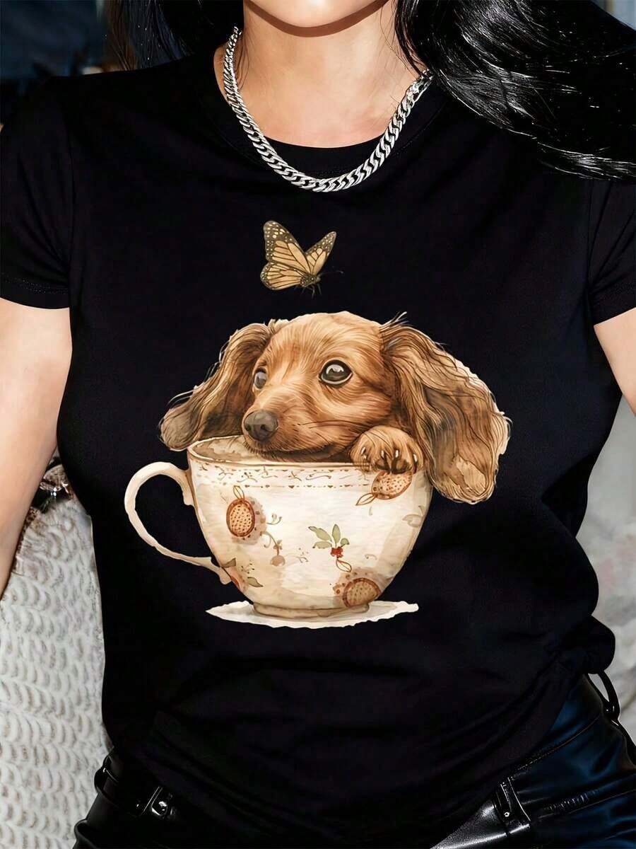 Nuevas llegadas para el verano. Camiseta Casual de Manga Corta para Mujer - Diseño Gráfico de Dachshund en Taza de Té y Mariposa para Pascua, Suave, Cuello Redondo, Corte Regular, Lavable a Máquina, Top de Primavera Verano, Camiseta con Estampado de Perro, Material Semitransparente, Top para Uso Diario, Camiseta Gráfica, Ligera, Camiseta Estampada, Blusa de Moda, Camisa > Hermosa. - Negro - Ver 1