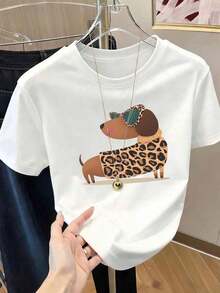 Camiseta de manga corta con cuello redondo y estampado para mujer. Perfecto para citas, desplazamientos diarios y salidas informales. Diseño clásico minimalista de cuello redondo, fácil de combinar y adecuado para todas las formas de cuerpo. - Blanco - Ver 1