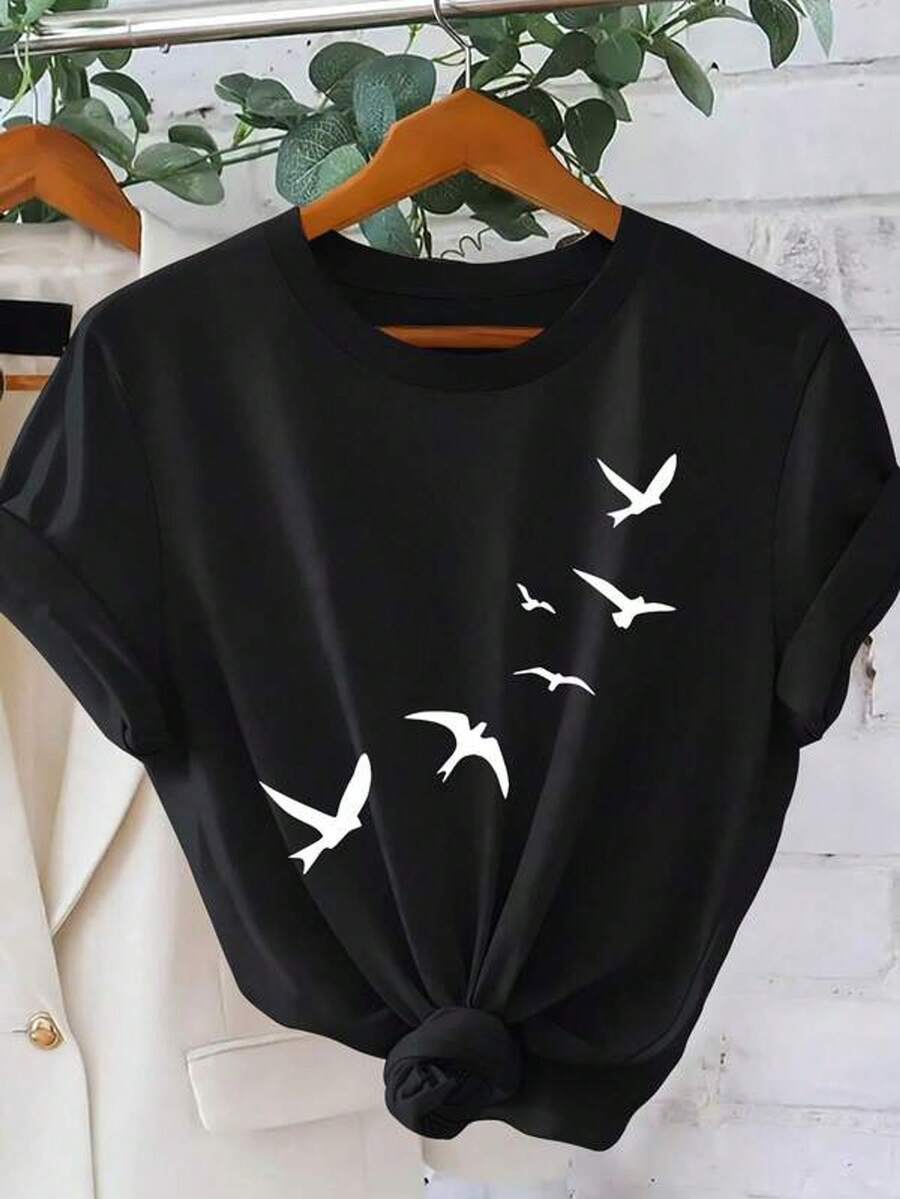 Camiseta gráfica de estilo moderno para mujer - Diseño de golondrina voladora, cuello redondo casual, manga corta, suave rosa con silueta negra, perfecta para verano, deportes y vacaciones, top de tempor completa  Estampado de animales juguetones  Tejido elástico