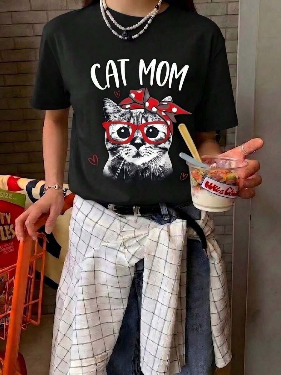 Camiseta de manga corta con cuello redondo y estampado para mujer, corte holgado informal, tela súper suave y cómoda, estilo de moda urbana, camiseta gráfica clásica que combina con todo, top básico diario ligero y transpirable, perfecta para uso diario, vacaciones informales, ir al trabajo, salidas al aire libre, reuniones de fin de semana, compras y actividades de ocio, camiseta casual de gran tamaño y a la moda para damas. VJNI - Negro - Ver 1