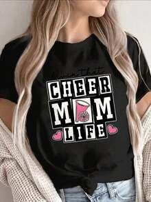 Camiseta gráfica para mujer Cheer Mom LifeNegra con letras de Cheer rosas y estampado de pompones, top casual ligero de manga corta y cuello redondo para eventos de cheerleading, ropa de evento, diseño divertido, ajuste cómodo, tejido de elasticidad media 100% Algodón - Negro - Ver 6