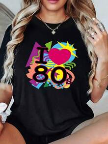 The Print Expresses A Love For The Colorful Vibe Of The 80s With Geometric Shapes And A Bright Heart. This Women's T-Shirt Is Made Of 100% Soft And Comfortable Cotton For Everyday Wear. - 黑色 - 查看 1