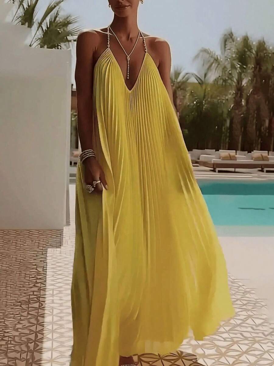 Vestido vacacional de tirantes con escote V profundo, espalda descubierta, pliegues y falda amplia, estilo europeo y americano - Amarillo - Ver 1
