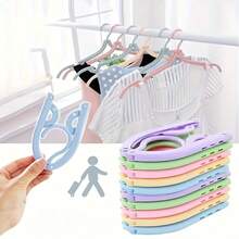 12 chiếc móc treo quần áo gấp gọn đa năng, tiện dụng cho người đi du lịch và công tác. - Nhiều màu - Xem 6
