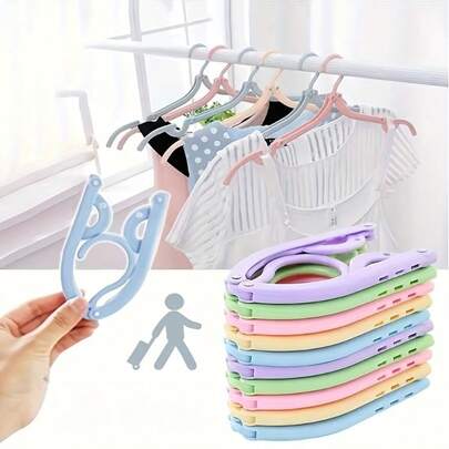 12 chiếc móc treo quần áo gấp gọn đa năng, tiện dụng cho người đi du lịch và công tác.