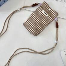 1个时尚简约格子化妆包，多功能设计，适合日常使用和旅行，包含钥匙、口红和洗漱用品隔层。 - 彩色 - 查看 14