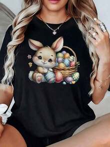Basket With Colorful Eggs And Rabbit Ears That Evoke Joy And Renewal, Representing A Festive Symbol Of Hope. Soft And Comfortable 100% Cotton Women's T-Shirt, Ideal For Everyday Wear. - 黑色 - 查看 1