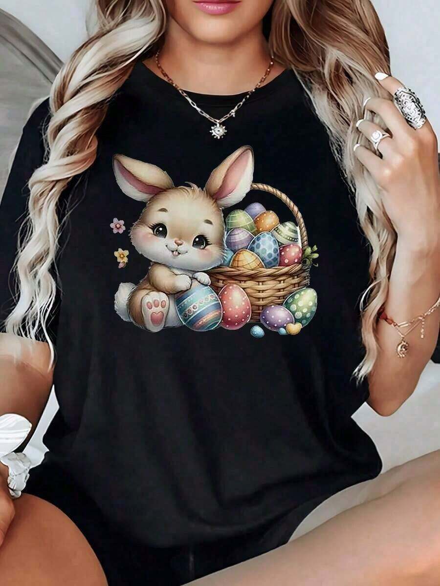 Basket With Colorful Eggs And Rabbit Ears That Evoke Joy And Renewal, Representing A Festive Symbol Of Hope. Soft And Comfortable 100% Cotton Women's T-Shirt, Ideal For Everyday Wear. - 黑色 - 查看 1