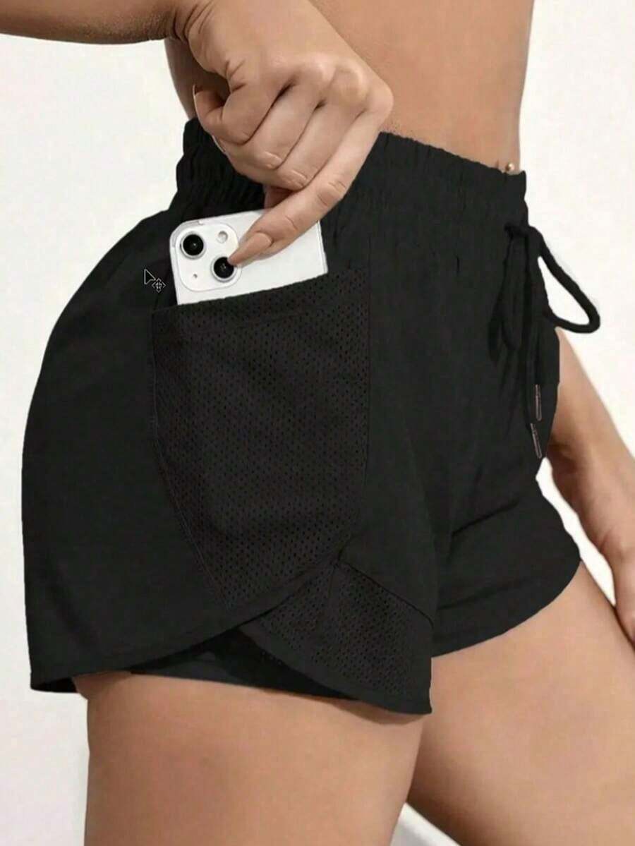 Pantalones cortos de yoga 2 en 1 para mujeres, hechos de tela de secado rápido con bolsillos de malla - Adecuados para fitness casual, entrenamientos en el gimnasio - Ideal para el verano - Diseñado específicamente para mujeres - Perfecto para un estilo de vida activo - Negro - Ver 1