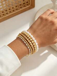 Set de 5 piezas de pulseras elásticas con cuentas de perlas falsas de CCB dorado, estilo INS, pulseras versátiles y de moda para mujeres - Dorado - Ver 1