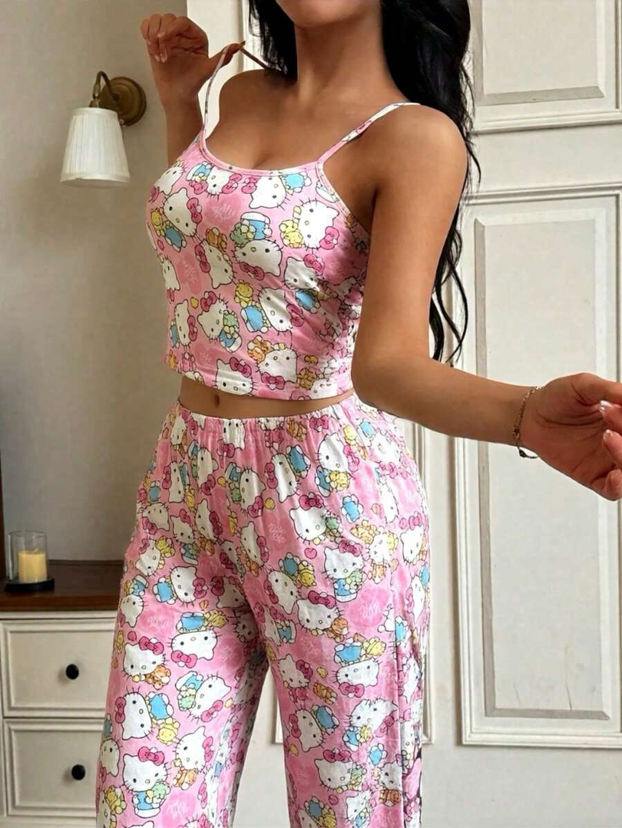 Bộ đồ ngủ nữ Hello Kitty 2 món gồm áo hai dây in họa tiết và quần ống đứng cạp chun dễ thương. - Hồng - Xem 1
