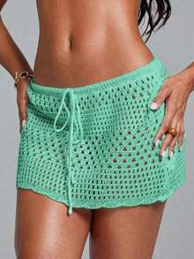Swim Lushoire Falda pareo con dobladillo ondulado para la playa, con patrón geométrico perforado y floral - verde menta - Ver 1
