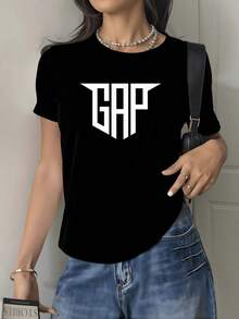 Símbolo tipográfico con letras grandes que evocan fuerza equilibrio y confianza creando una sensación moderna y urbana perfecta para expresar personalidad única camiseta de mujer casual elegante - Negro - Ver 1