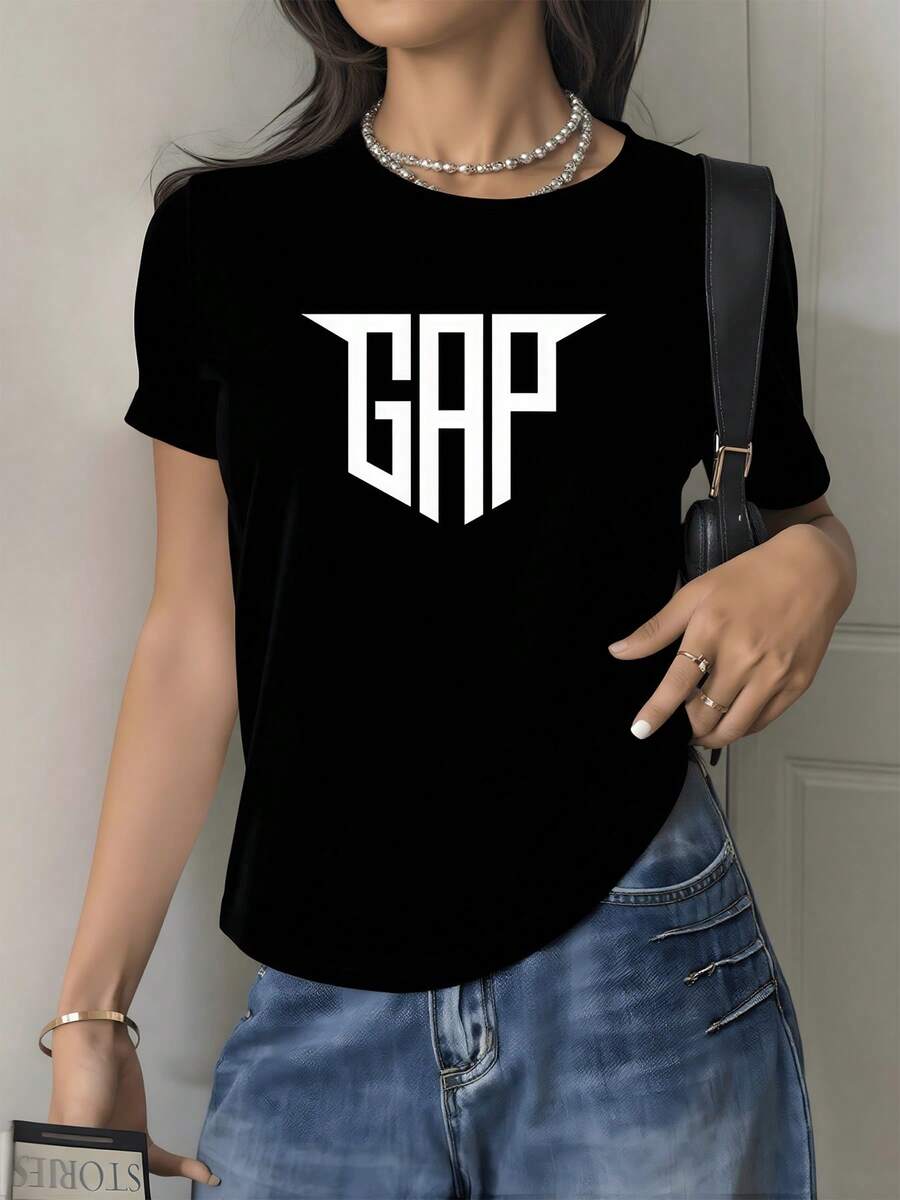 Símbolo tipográfico con letras grandes que evocan fuerza equilibrio y confianza creando una sensación moderna y urbana perfecta para expresar personalidad única camiseta de mujer casual elegante - Negro - Ver 1
