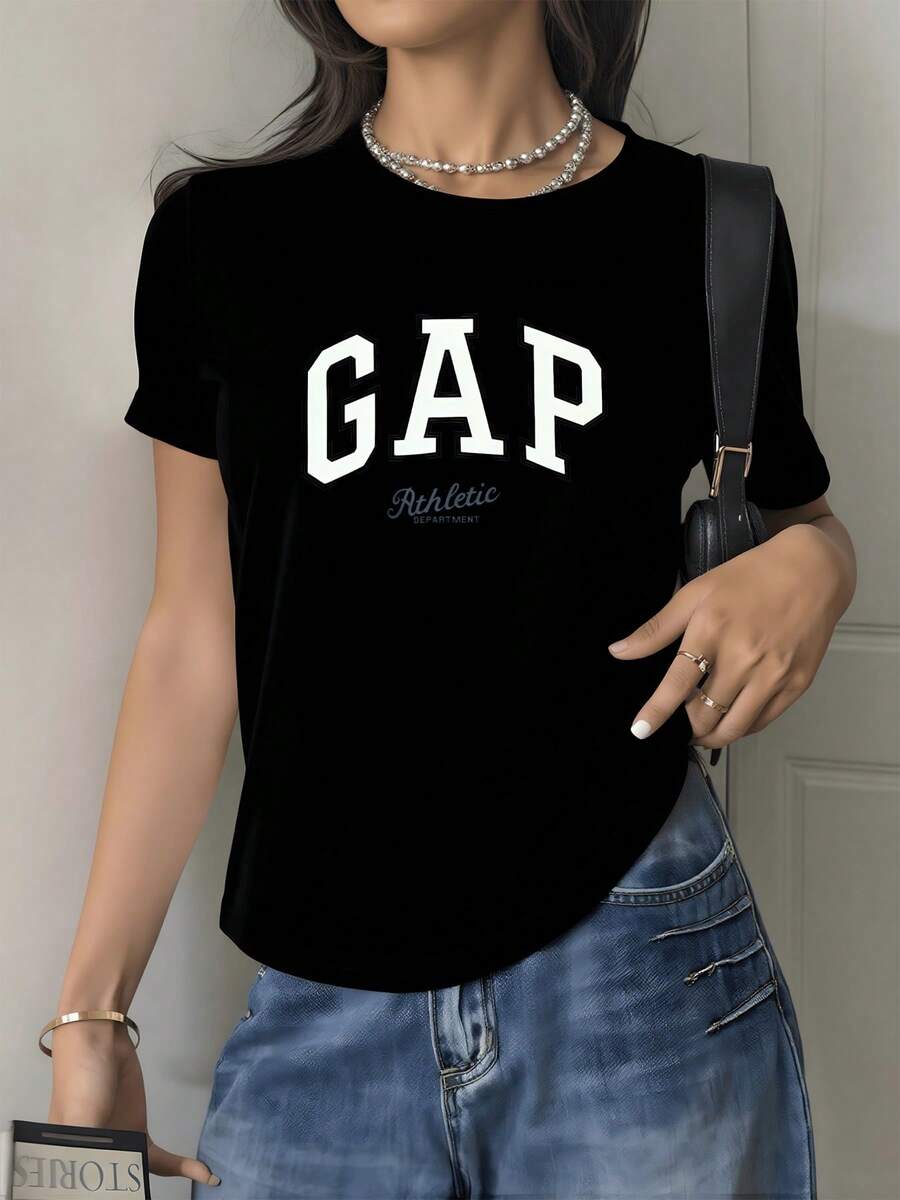 Letras grandes que representan energía dinámica y espíritu deportivo evocando confianza y actitud moderna perfecta para días casuales y momentos activos camiseta de mujer cómoda y versátil para diario - Negro - Ver 1