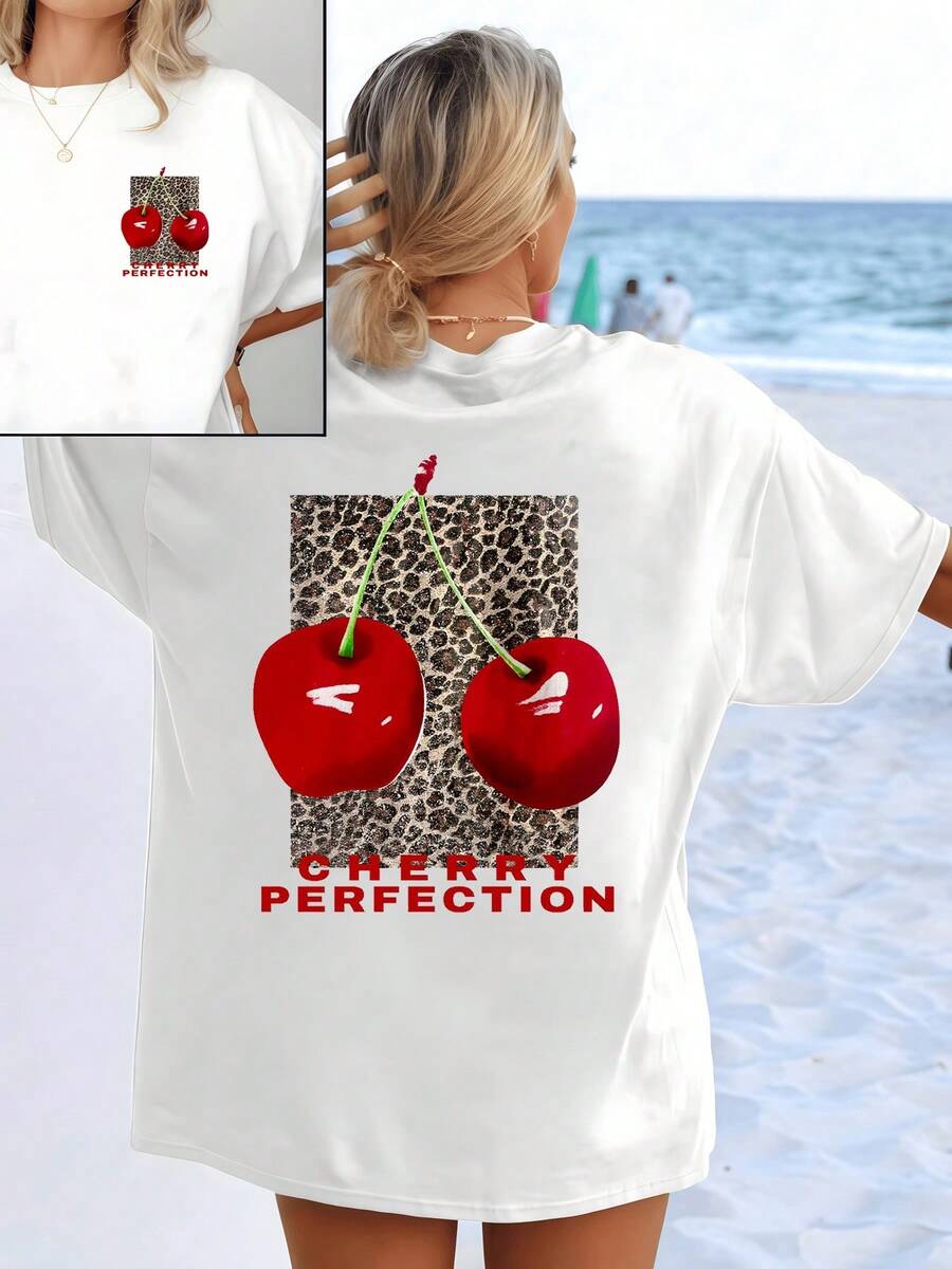 Two Bright Red Cherries Symbolize Sweetness And Energy Against An Animal Pattern Background That Evokes Strength And Modern Elegance. Women's T-Shirt With Double Print Front And Back For A Fresh And Summery Look. - White - View 1