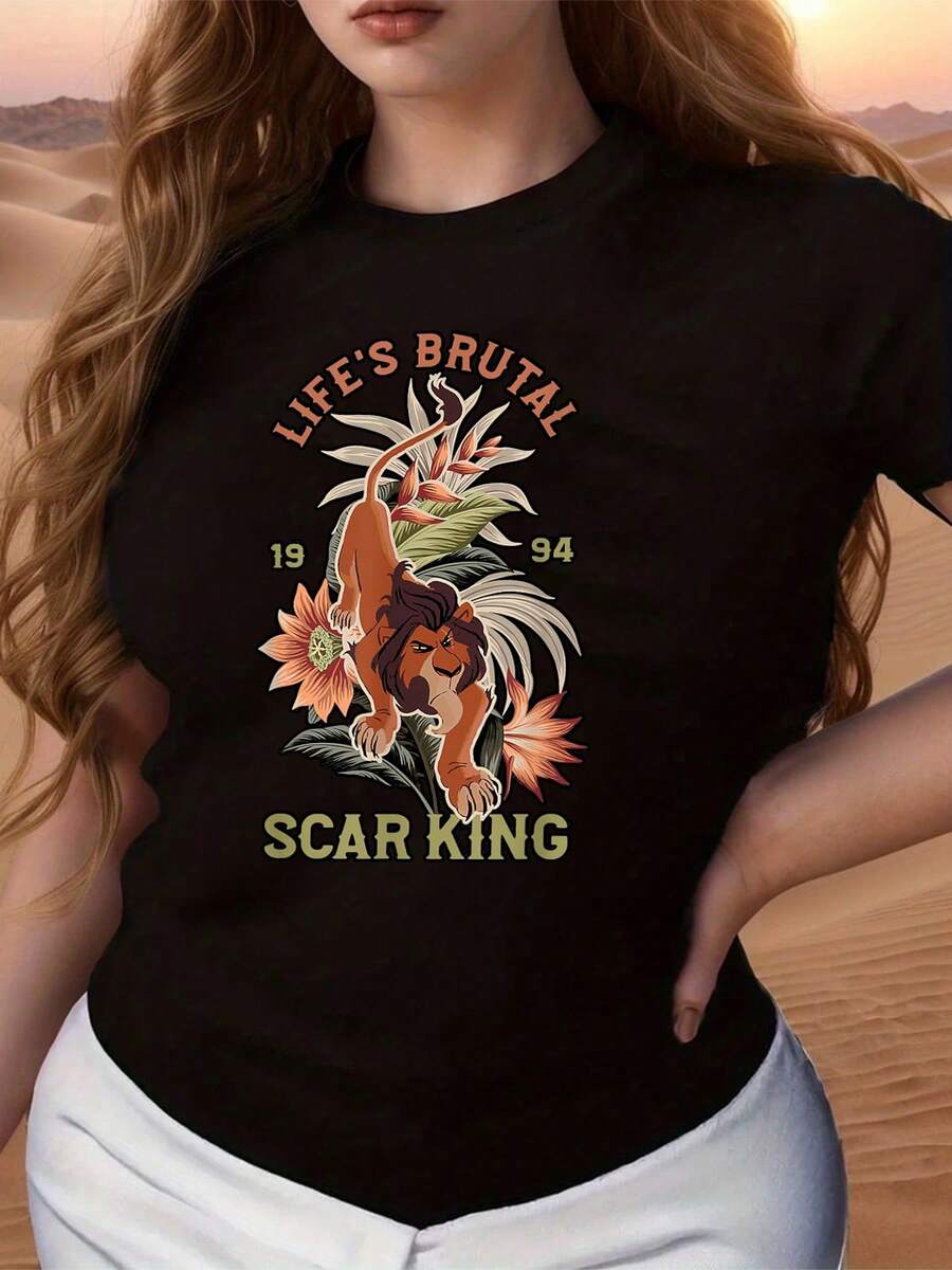 Majestic Lion Surrounded By Tropical Flowers Symbolizing Strength, Resilience, And Courage In The Face Of Life's Hardships, Conveying Wild Energy And An Indomitable Spirit. Comfortable Casual Women's T-Shirt For Everyday Wear And Walks. - 黑色 - 查看 1