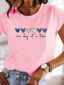 Women's Casual Short-Sleeve Crew Neck T-Shirt In Light Blue With A Heart Print That Says "One At A Time" - Made Of Soft Polyester, Machine Washable, A Spring/Summer Fashion Essential, Everyday T-Shirt | Crew Neck T-Shirt | Polyester Fabric - 羅莎 - 查看 1