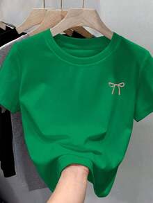 Free Shipping, Local Delivery In Mexico, Delivery In 4 Days. Women's T-Shirt Made Of 100% Cotton, Soft And Comfortable, With Short Sleeves And A Round Neck, Featuring A Small Pink Bow Print. - 翡翠綠 - 查看 1