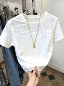 Camiseta de mujer de manga corta y cuello redondo con bordado de lentejuelas en forma de lazo, 56% algodón, estilo minimalista de moda, regalo para amigos - Blanco - Ver 3