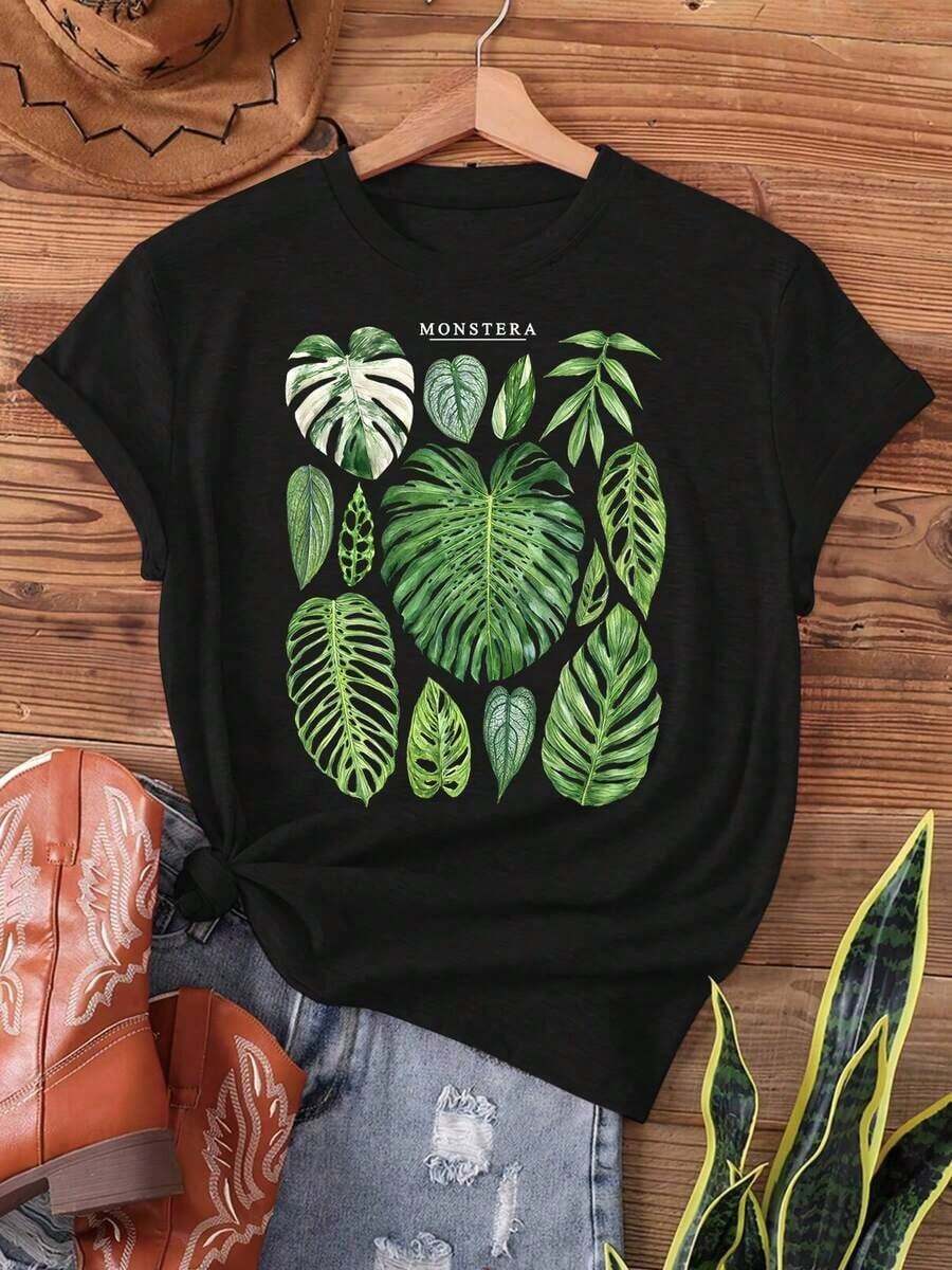 disfraz halloween hombreCamiseta de mujer con estampado de hojas tropicales de monstera y filodendro - Top de manga corta semitransparente de color gris oscuro con cuello redondo para verano y primavera, camiseta casual con estampado botánico para amantes de las plantas. Camiseta de hombre Twilight Y2k. - Negro - Ver 1