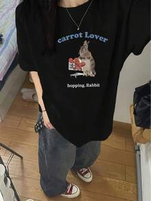 Short-Sleeved T-Shirt With A Rabbit Print And Blue Lettering, Y2K Style. New Summer Fashion For Women, Versatile, Loose-Fitting, Round Neck, Y2K Top. Suitable For All Occasions. PTTI - 黑色 - 查看 2