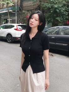 Áo khoác cardigan tay ngắn cài cúc dáng ôm thanh lịch màu đen, thích hợp cho mùa xuân hè 2025. - màu đen - Xem 1