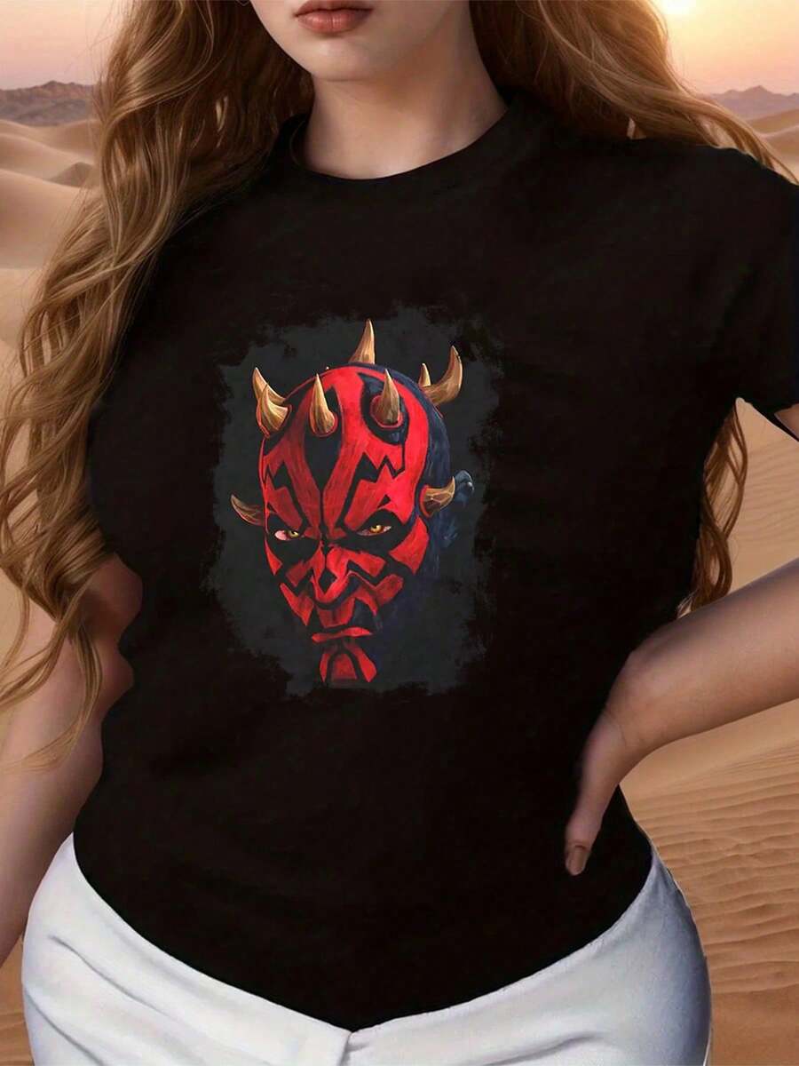 Red Face With Golden Horns Symbolizing Inner Strength And Rebellious Spirit With A Defiant Gaze And Powerful Energy For Confident Women. Comfortable And Modern Women's T-Shirt For Everyday Wear. - Black - View 1