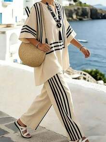 2026 Nuevo estilo casual de vacaciones de primavera/verano, conjunto de lino a rayas en beige y negro + blusa con estampado geométrico de manga murciélago + pantalones anchos con rayas laterales. Estilo relajado de vacaciones en la playa, conjunto a rayas en beige y negro, transpirable y suave para el verano, pantalones de cintura elástica, conjunto casual de 2 piezas para vacaciones, conjunto versátil de 2 piezas para ir al trabajo. - Blanco y Negro - Ver 6