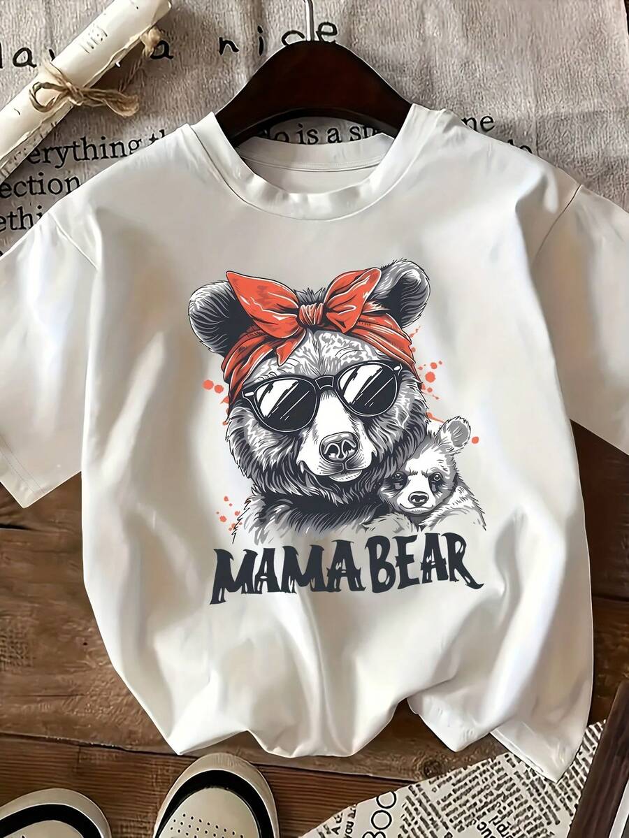 Camiseta casual versátil para mujer, hecha de algodón puro para una comodidad excepcional, diseño sencillo para una moda diaria sin esfuerzo. Camiseta de manga corta con estampado de oso de dibujos animados y el eslogan "Mama Bear", estilo casual versátil, top casual de manga corta con cuello redondo para verano y primavera, ropa de mujer. - Blanco - Ver 1
